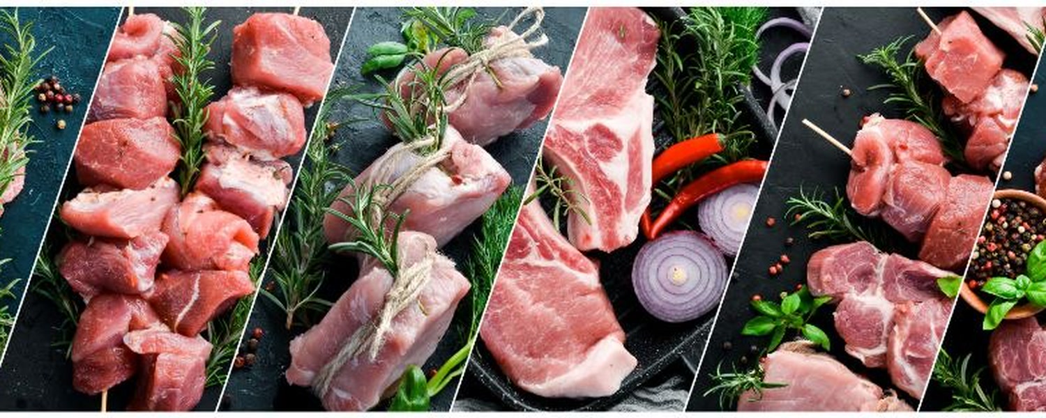 Assorted fresh pork cuts with herbs and spices